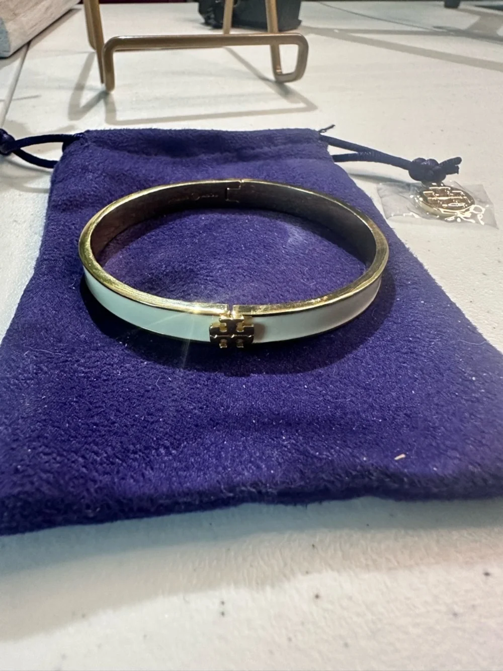 Tory Burch Cream Enamel and Gold Logo Hinge Bangle